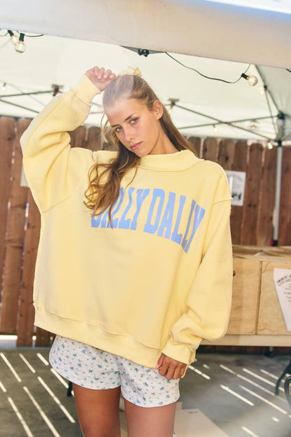 "DILLY DALLY' Mockneck Sweatshirt: Yellow