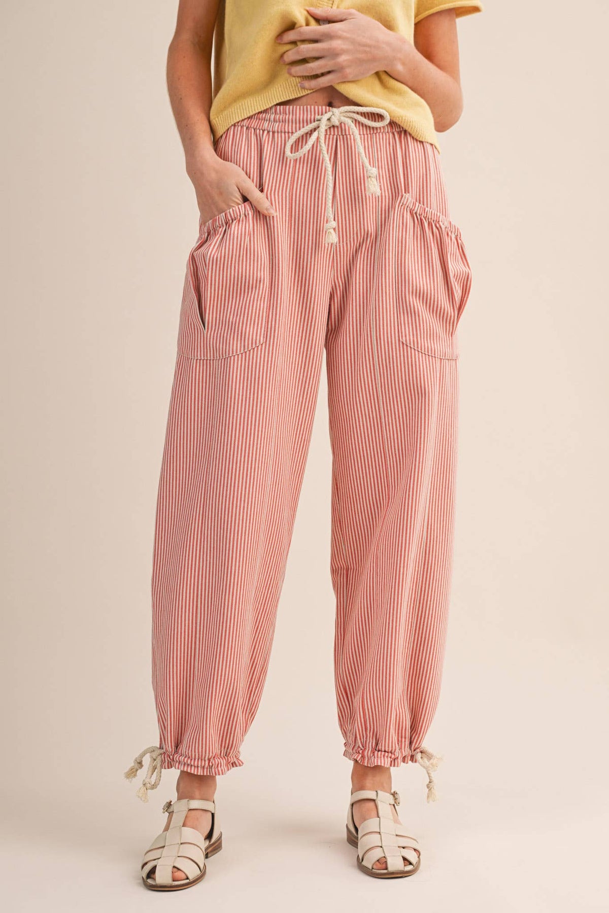 STRIPED PARACHUTE PANTS: SALMON PINK STRIPE