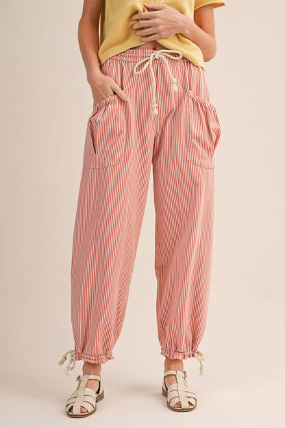 STRIPED PARACHUTE PANTS: SALMON PINK STRIPE