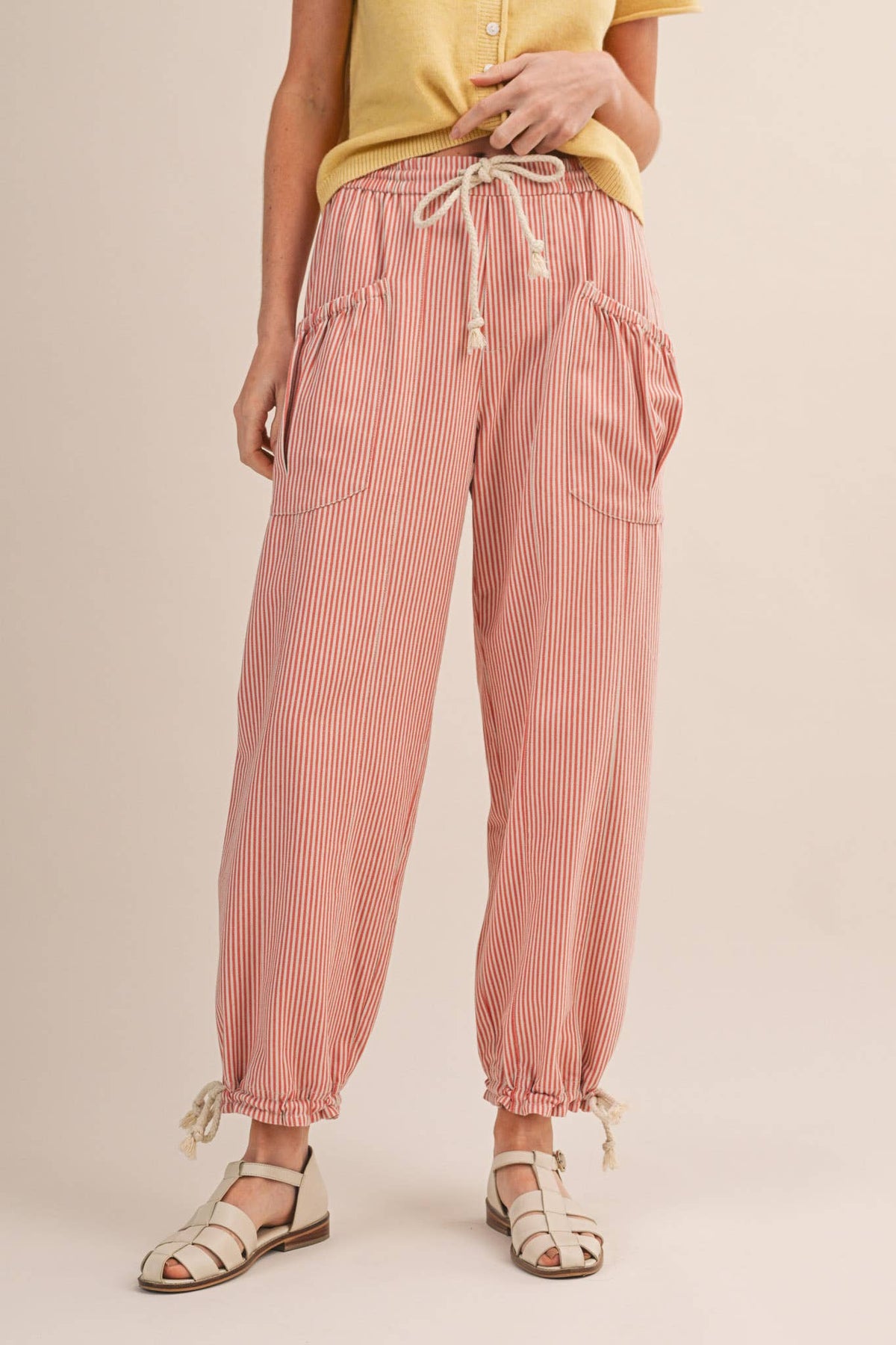 STRIPED PARACHUTE PANTS: SALMON PINK STRIPE