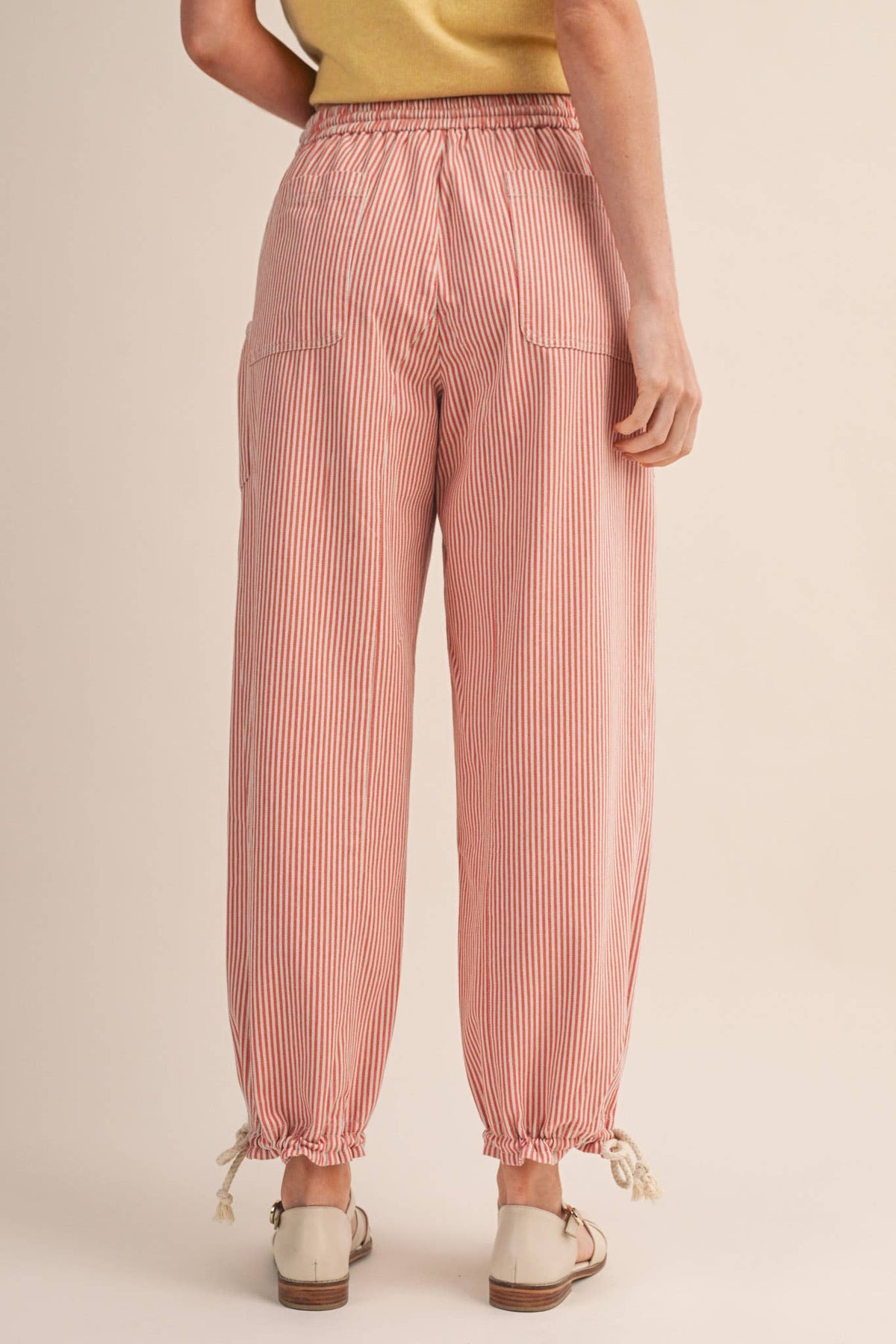 STRIPED PARACHUTE PANTS: SALMON PINK STRIPE