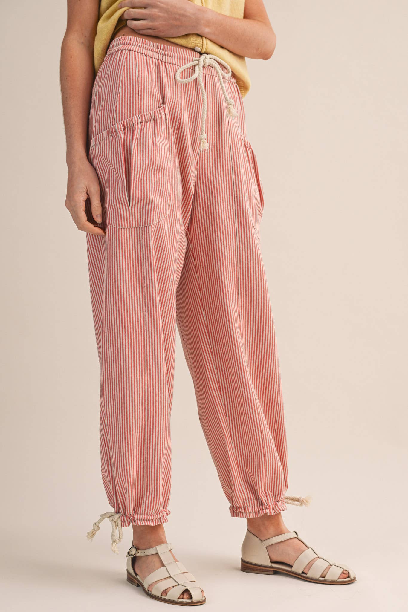 STRIPED PARACHUTE PANTS: SALMON PINK STRIPE