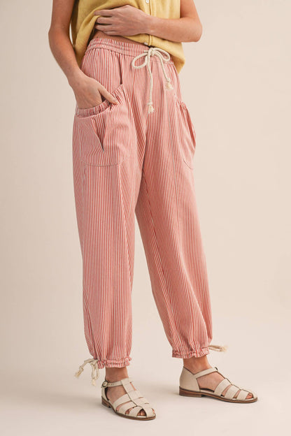 STRIPED PARACHUTE PANTS: SALMON PINK STRIPE