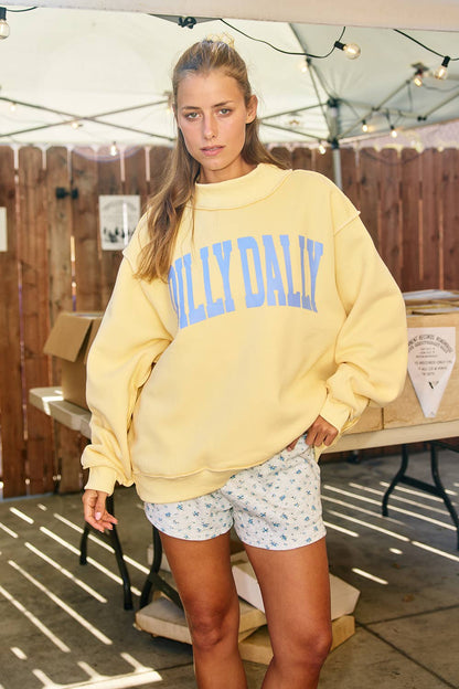 "DILLY DALLY' Mockneck Sweatshirt: Yellow