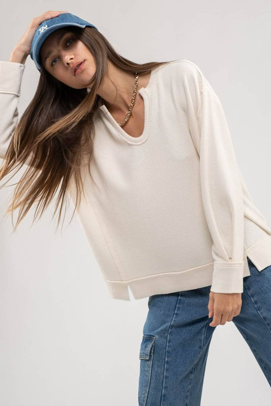 RAW EDGE SPLIT NECK AND HEM RIB KNIT TOP